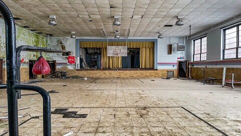 Someone was inside the abandoned elementary school with us