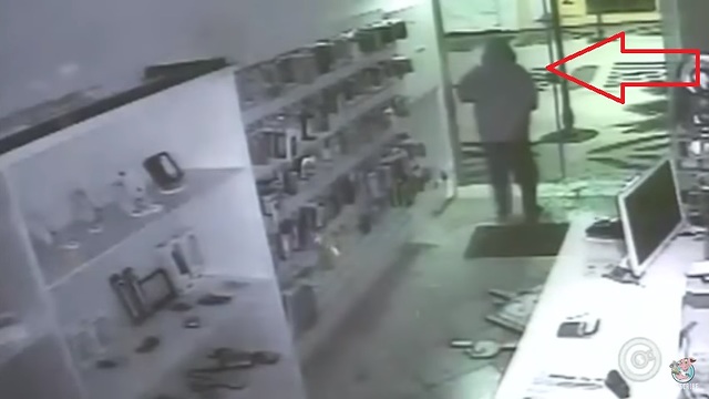 Robber Face Plants into Glass Door