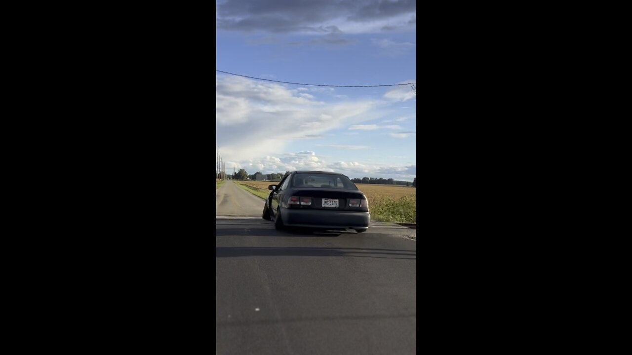 Stanced Honda Civic EK Coupe Jumps Tracks