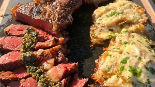 Grilled ribeye and cheesy cast iron potatoes