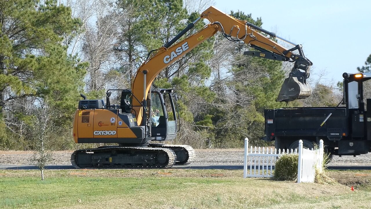 BACKHOES AND SUNSHINE