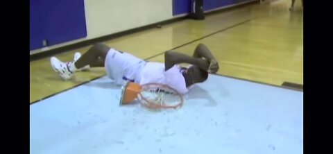 Young Shaq breaks backboard