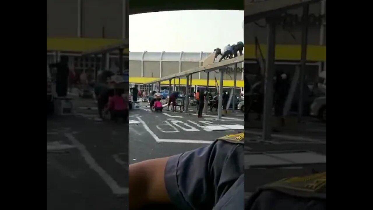 SA Riots ( looters removing solar panels )