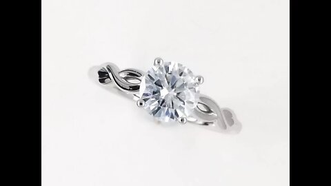 Simply beautiful 1 carat moissanite engagement ring with infinity symbols