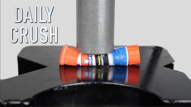 Crushing a glue stick with hydraulic press