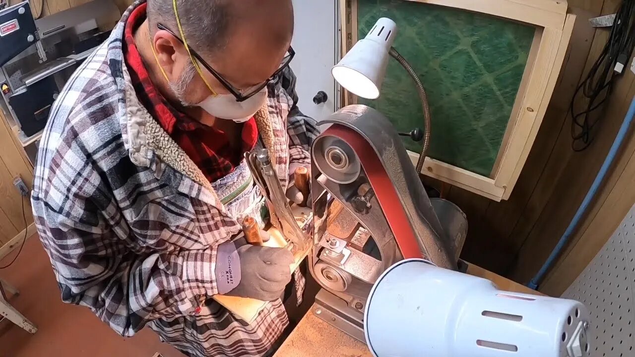 Back in the knife shop grinding and sanding bevels on the bench grinder