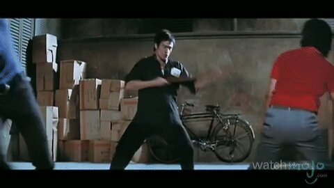 Cross kick Studio Films Bruce Lee fight scene beat up thugs with long staff