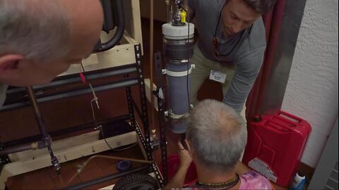 Greg Volk and Team Discussing the Fuel System and Design Philosophy