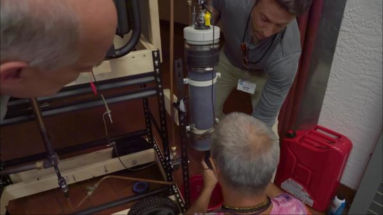 Greg Volk and Team Discussing the Fuel System and Design Philosophy