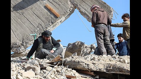 Syrian rescuers respond as buildings wrecked by fighting in town in Aleppo Governorate