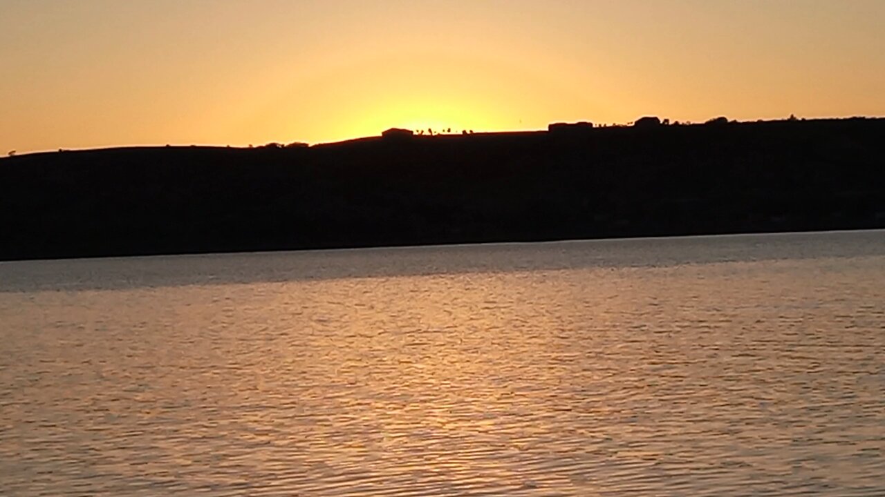 The sun going down over the Missouri river