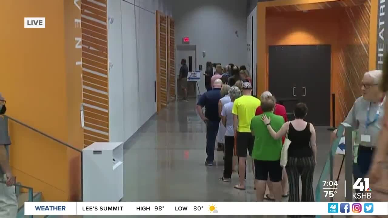 Voters line up as polls open for primary elections in Kansas