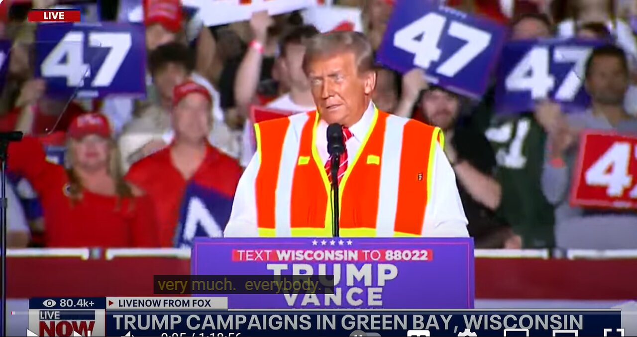 Trump wears orange vest during campaign speech in battleground Wisconsin