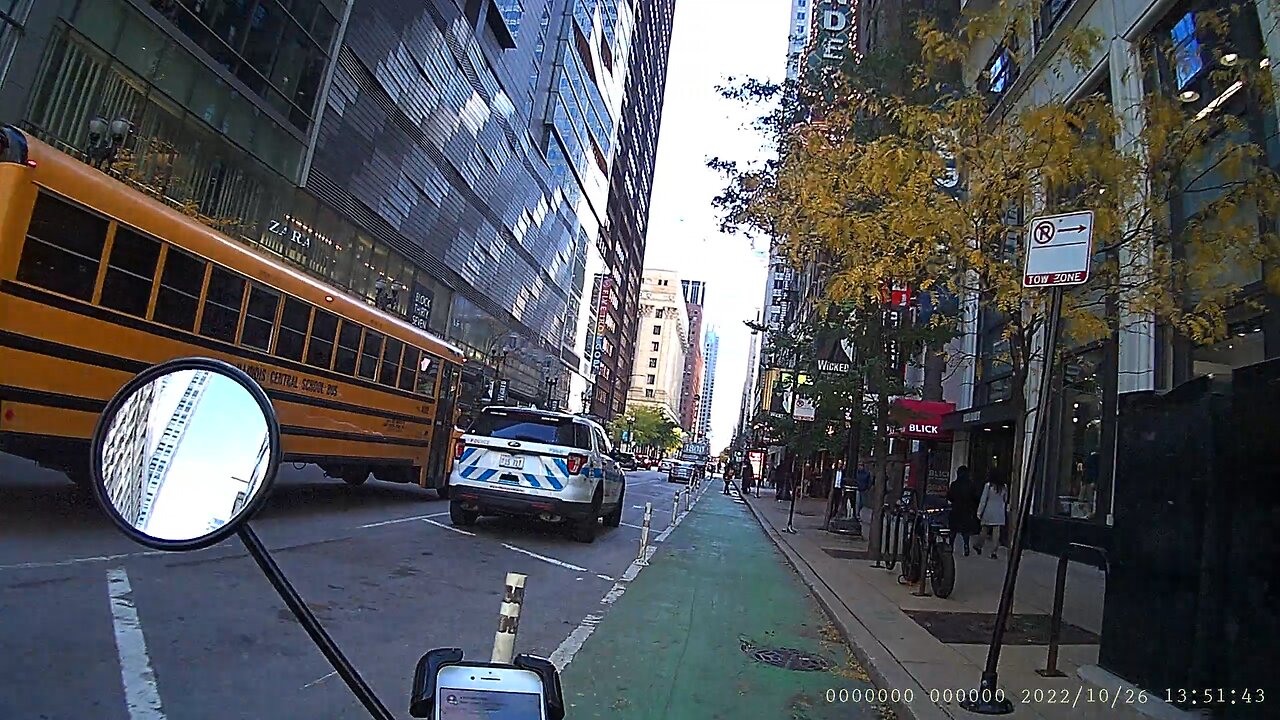 Standing on the bike lane plus a car turning on a green bike light