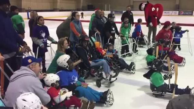 Kids with special needs take to the ice