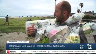 Man wears suit made of trash to raise awareness