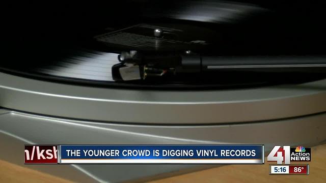 Vinyl record sales spike with younger listeners