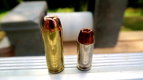 50ae vs 45acp HORNADY XTPs - How Many Paper Plates???