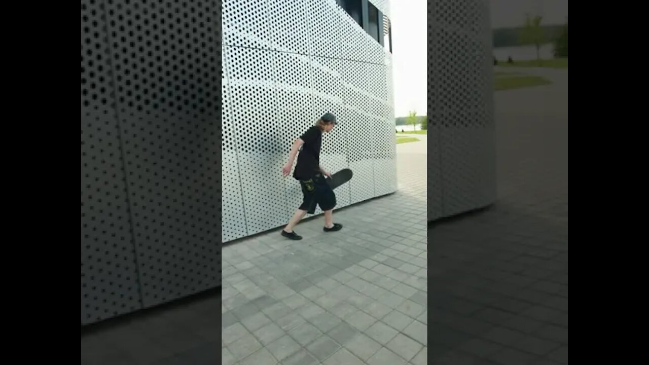 A Boy Skateboarding at a Park #Shorts