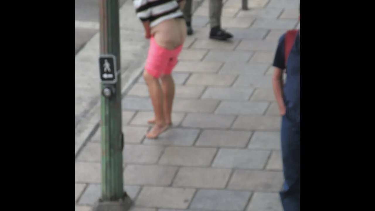 Woman Urinates on Public Bench