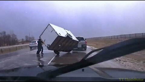 Deputy helps flip over trailer on side of southern Minnesota highway