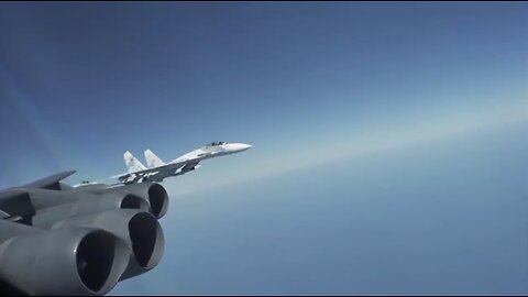 Russian SU-27 jets buzzing around U.S. B-52 over the Black Sea