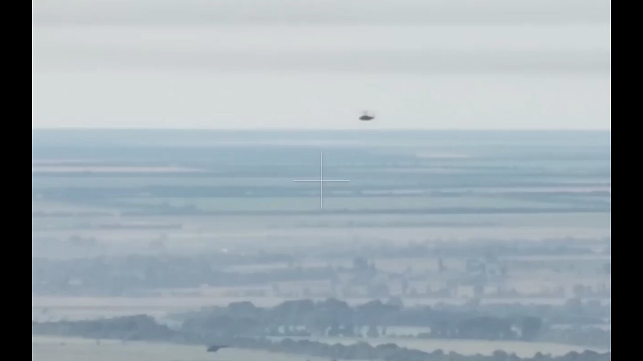 Russian Ka-52 attack helicopter long range shot on Ukrainian armoured vehicle