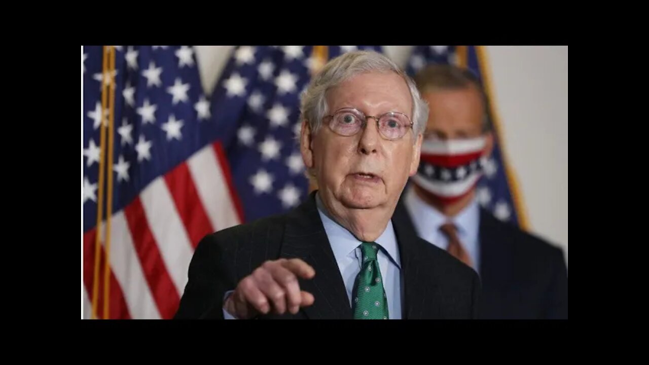 Mitch McConnell speaks to the press along with Senate Republicans