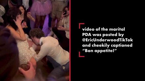 Newlyweds' sexy dance divides viewers: Groom licks bride's legs, puts head in crotch in front of guests