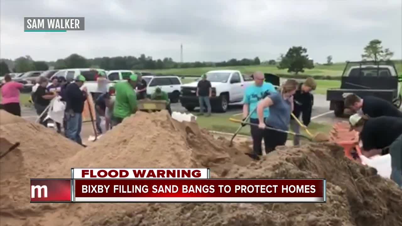 Bixby filling sand bags to protect homes