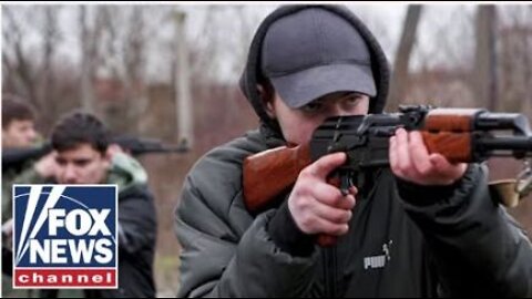 Ukranian members of parliament take up arms, join citizens on the street to fight Russians
