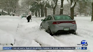 Snow tapering off but many highways remain closed