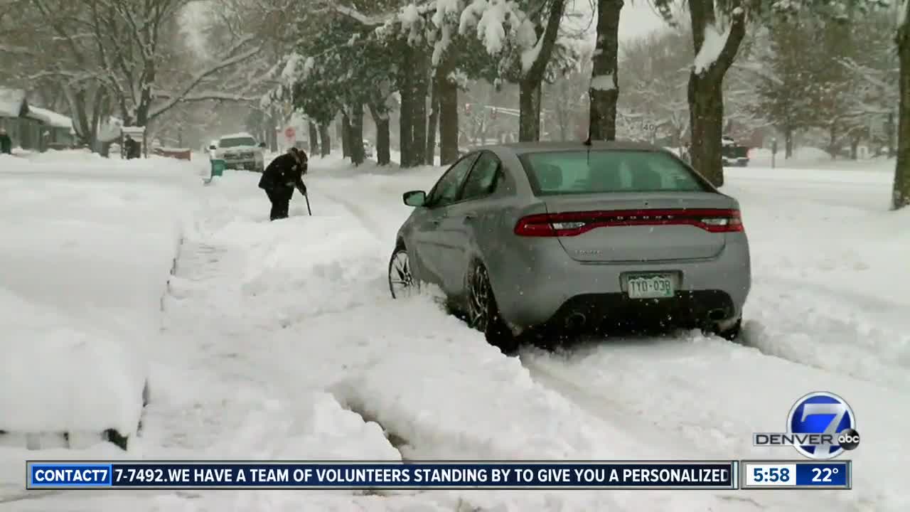 Snow tapering off but many highways remain closed