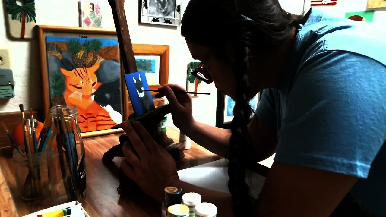 Adding The Whiskers To The Cat Painting