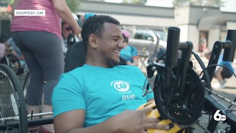 "It is a new beginning," paralyzed refugee receives hand-cycle from CAF-Idaho