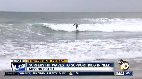Surfers hit waves to support kids in need