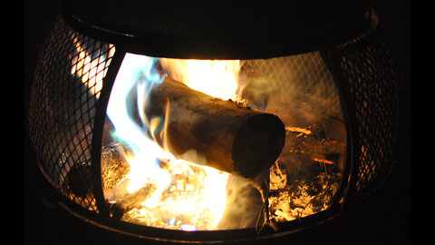 Just sitting beside the campfire.