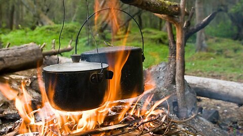 Lunch in the forest. A pot over the fire. Julien as a bonus.