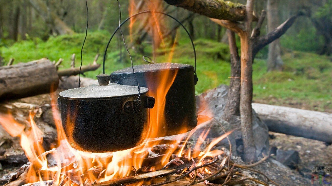 Lunch in the forest. A pot over the fire. Julien as a bonus.