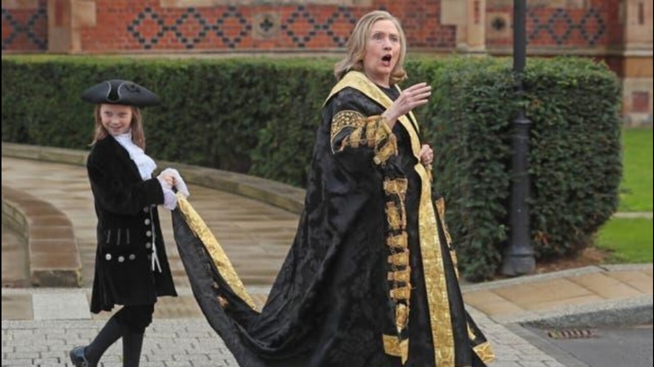 Hillary Clinton Heckled And Called "War Criminal" As She Enters Queens University In Belfast