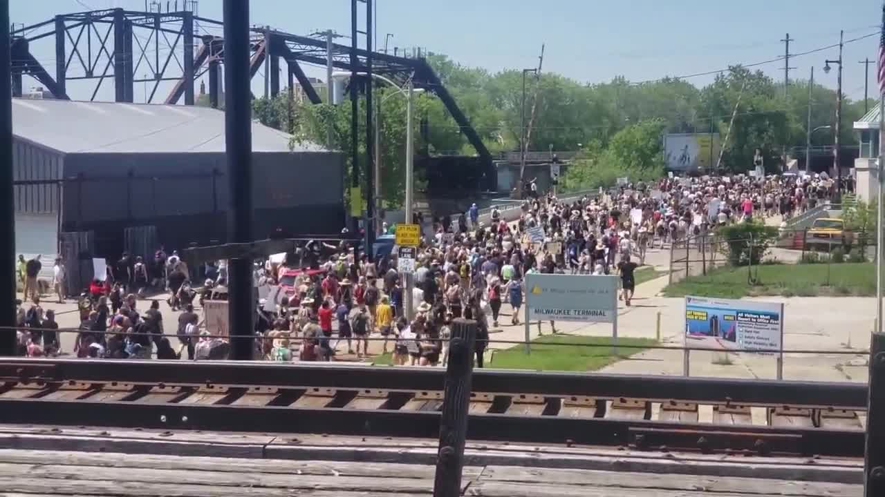 Peaceful protesters march through Milwaukee's Bay View neighborhood on Tuesday