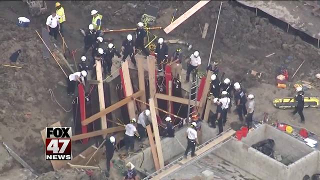 2 rescued from trench collapse in suburban Detroit