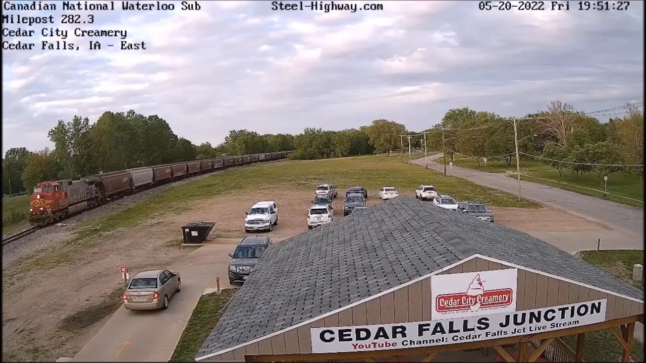 Fakebonnet Leading WB Empty Grain at Cedar Falls Junction and Mills Tower on May 20, 2022