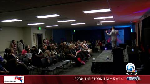 Motivational speaker talks to college students in Fort Pierce