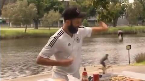 Australian Man Smacks Microphone Away From Reporter Asking About Lockdown While He Barbecues