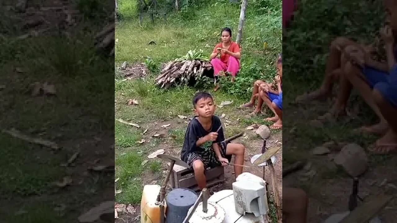 Insanely skilled kid drummer on bucket drums..