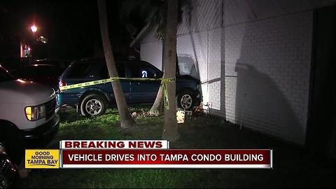 Vehicle drives into Tampa condo building