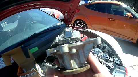 2013 Hyundai Veloster 6spd Turbo replacing the water pump, pulley, belt and thermostat