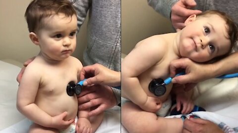 Sweet Baby Boy Rests Head On Nurse's Hand