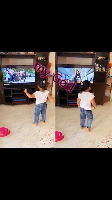 Toddler smashes TV while dancing